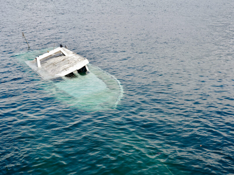 Power boat sinked in the sea coast of Hondarribia, Basque country, Spain