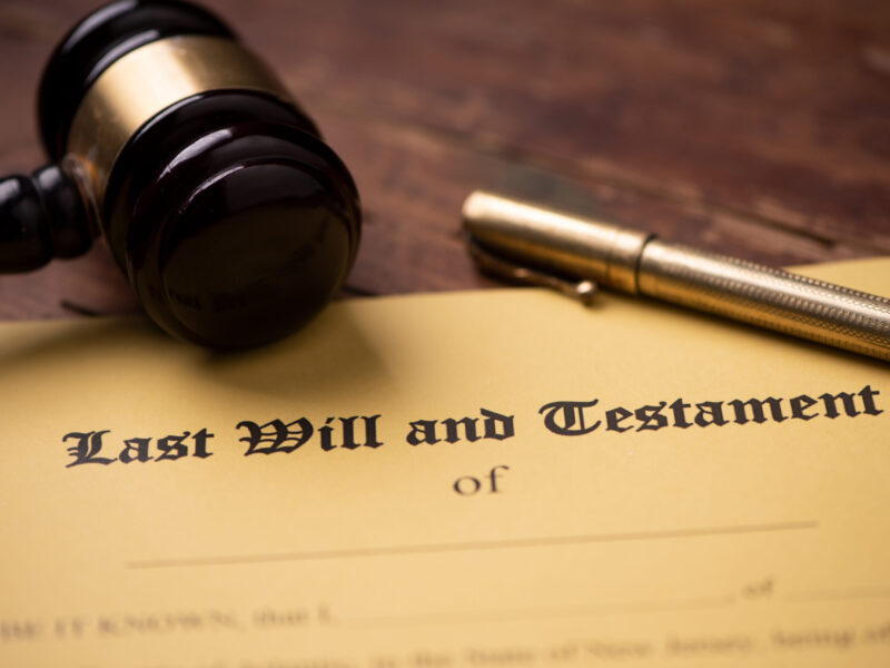 Last will and testament form with gavel. Decision, financial close up